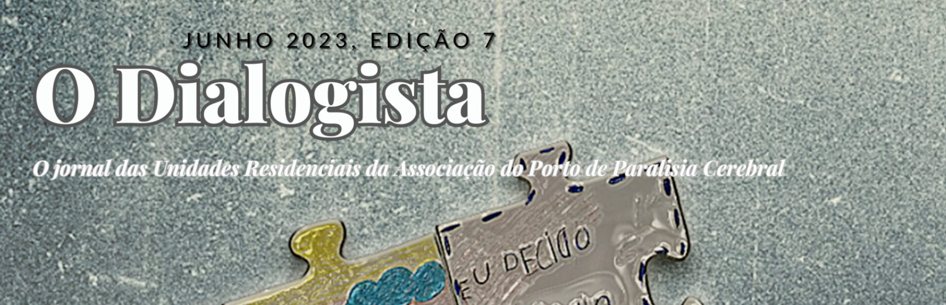 Cópia parcial da primeira página da edição 7 de “O Dialogista”. Página com fundo acinzentado e nove peças de puzzle (cada qual com a sua imagem e mensagem). Em destaque a palavra “Envelhecer”.